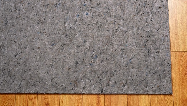 area rug felt under pad on hardwood floor | Sterling Carpet & Flooring