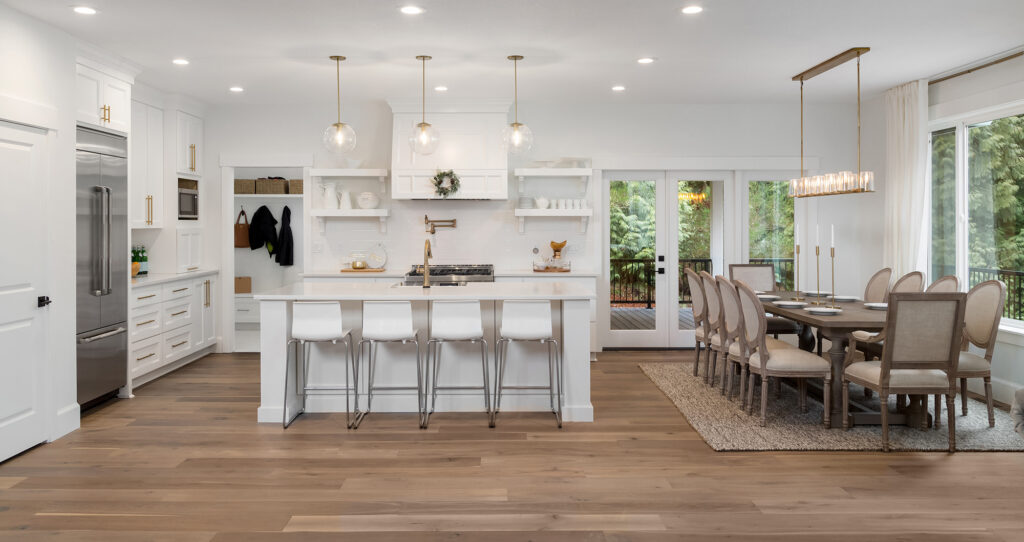 Durable Laminate Flooring in a large kitchen by Sterling Carpet & Flooring in Anaheim, CA & Mission Viejo, CA